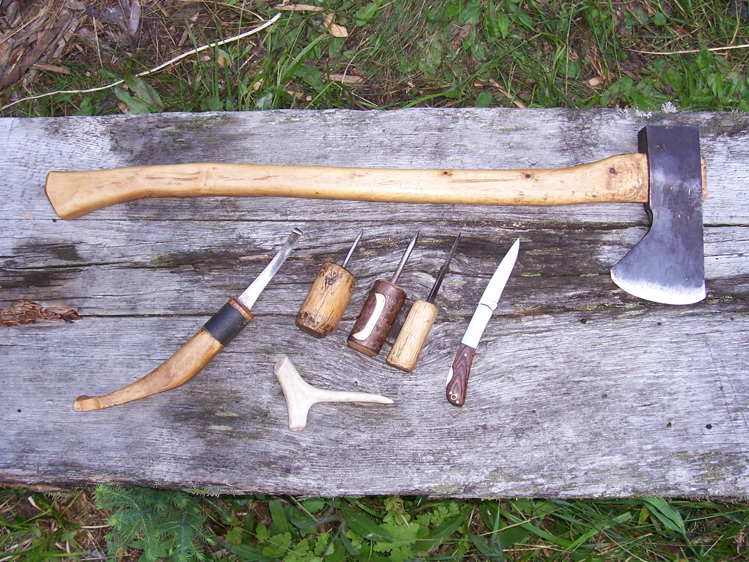 The basic tools include the axe, crooked knife, jack knife and a 